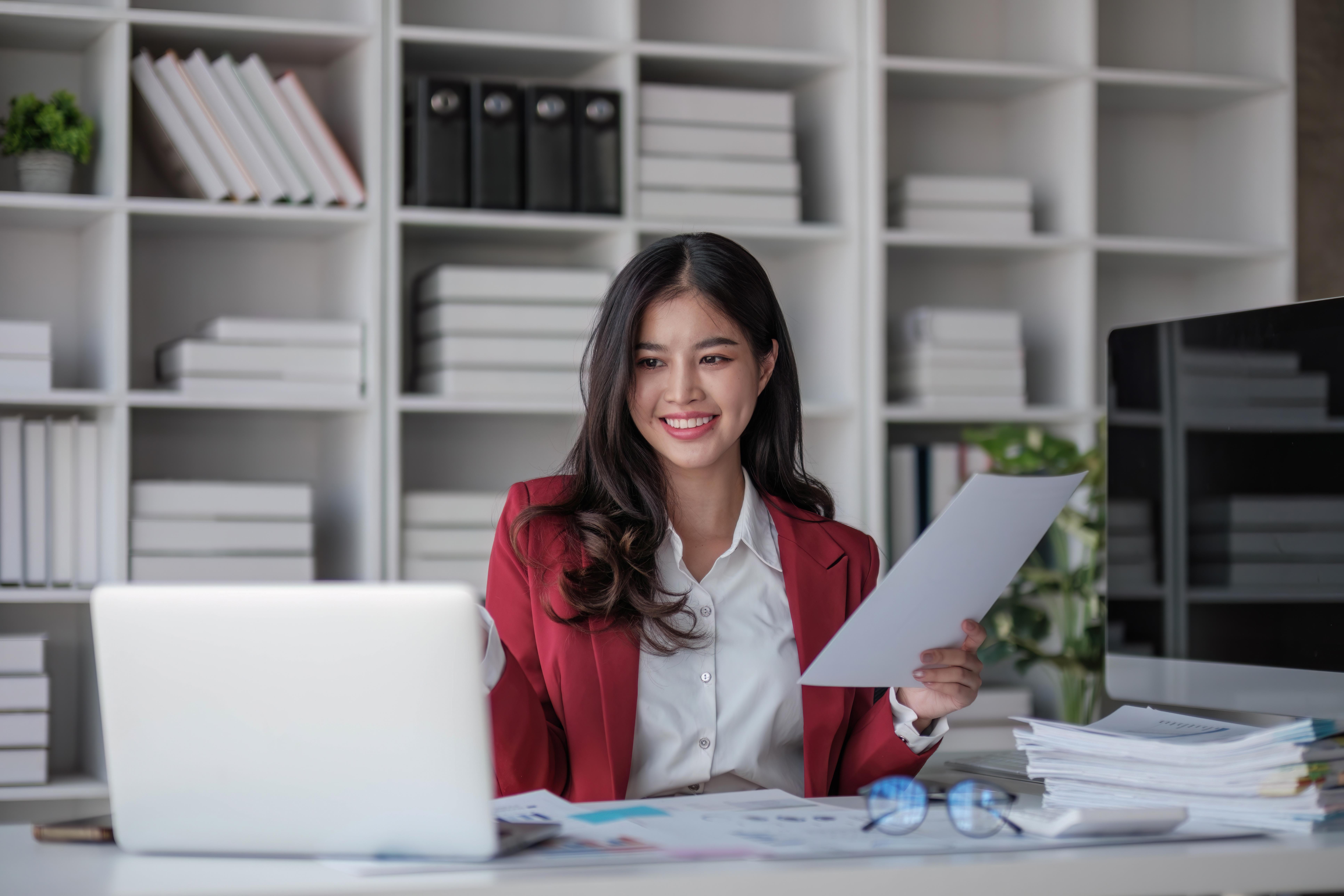 asian-business-woman-using-calculator-laptop-doing-math-finance-office-desk-tax-report-accounting-statistics-analytical-research-concept-1
