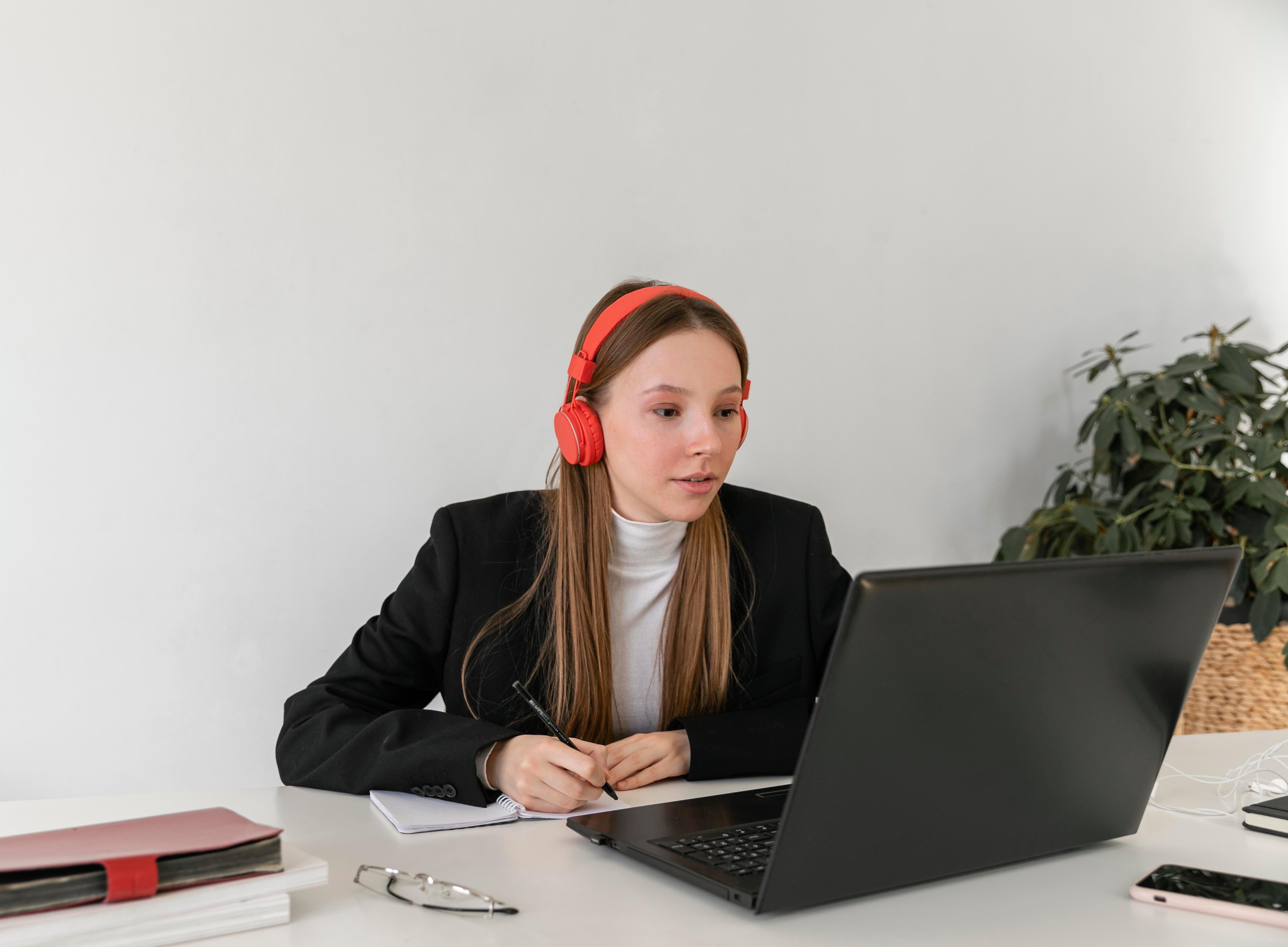 medium-shot-woman-working-with-headphones-1-1