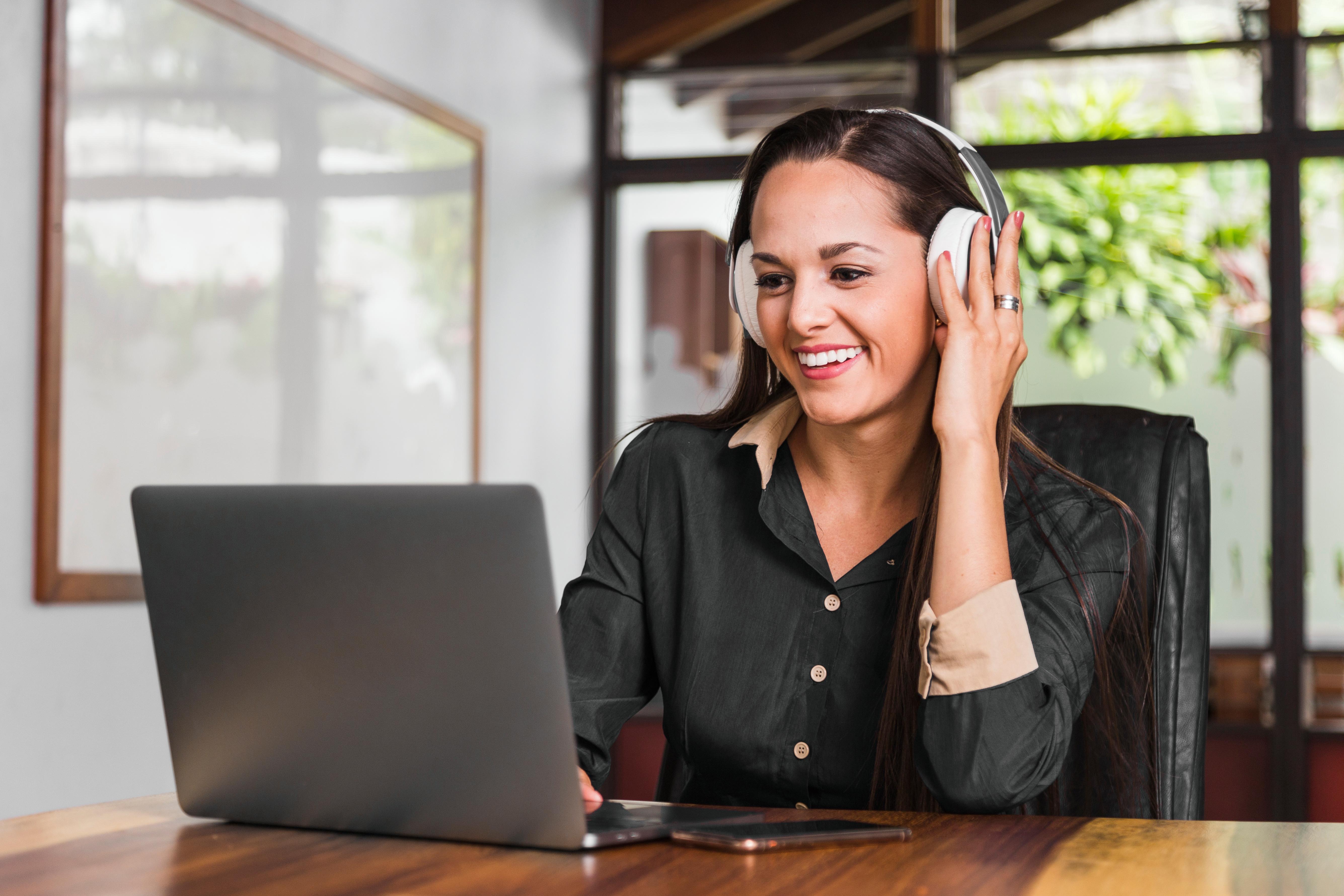 business-woman-wearing-headphones-1-1