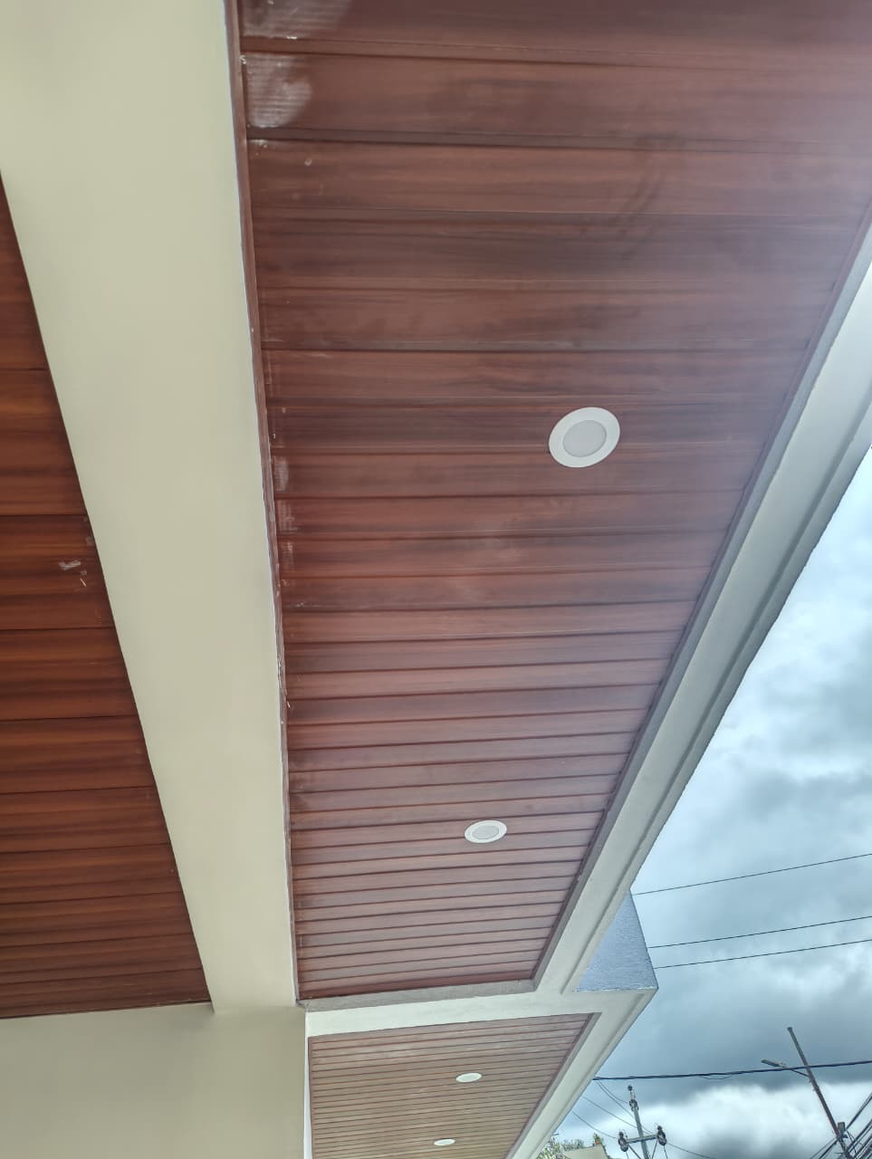 premium-wood-grain-pvc-ceiling-panel-installation.jpg