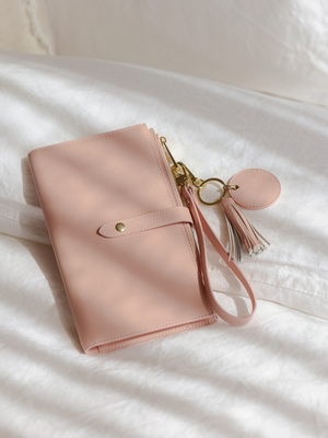 blush-pink-vegan-leather-travel-wallet-with-tassel-charm—mont-laurent